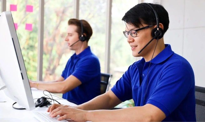 Support team assisting customers with WMS SaaS software and technical questions.